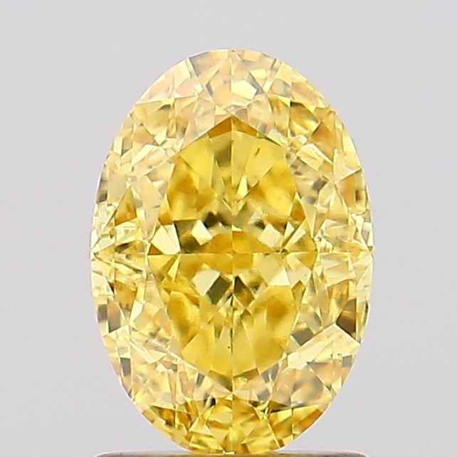 Loose Diamond - OVAL 1.69ct Fancy Vivid Yellow VS1: Loose Diamond - OVAL 1.69ct Fancy Vivid Yellow VS1 Source: This is a real non-mined Diamond that has been grown in a lab Shape: OVAL Carats: 1.69 Color: Fancy Vivid Yellow Certification: IGI Video: