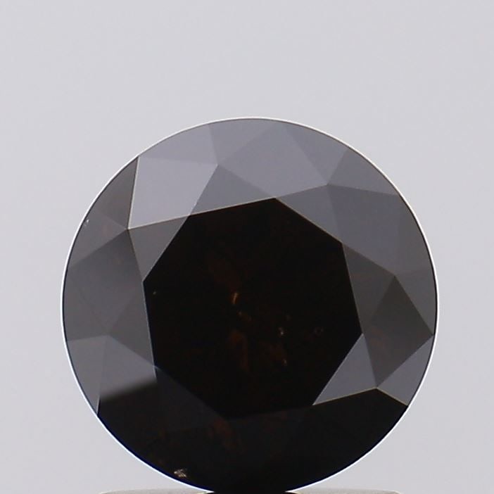 Loose Diamond - ROUND 1.3ct Fancy Deep Brown I1: Loose Diamond - ROUND 1.3ct Fancy Deep Brown I1 Source: This is a real non-mined Diamond that has been grown in a lab Shape: ROUND Carats: 1.3 Color: Fancy Deep Brown Certification: NONE Video: