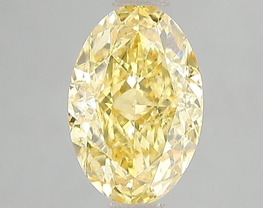 Loose Diamond - OVAL 2.01ct Fancy Vivid Yellow VS2: Loose Diamond - OVAL 2.01ct Fancy Vivid Yellow VS2 Source: This is a real non-mined Diamond that has been grown in a lab Shape: OVAL Carats: 2.01 Color: Fancy Vivid Yellow Certification: IGI Video: