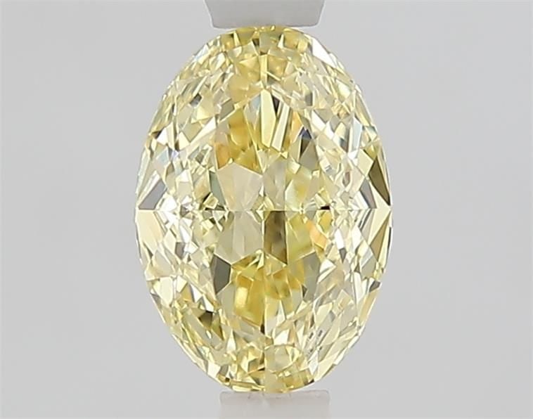 Loose Diamond - OVAL 1.01ct Fancy Yellow VVS2: Loose Diamond - OVAL 1.01ct Fancy Yellow VVS2 Source: This is a real non-mined Diamond that has been grown in a lab Shape: OVAL Carats: 1.01 Color: Fancy Yellow Certification: IGI Video: