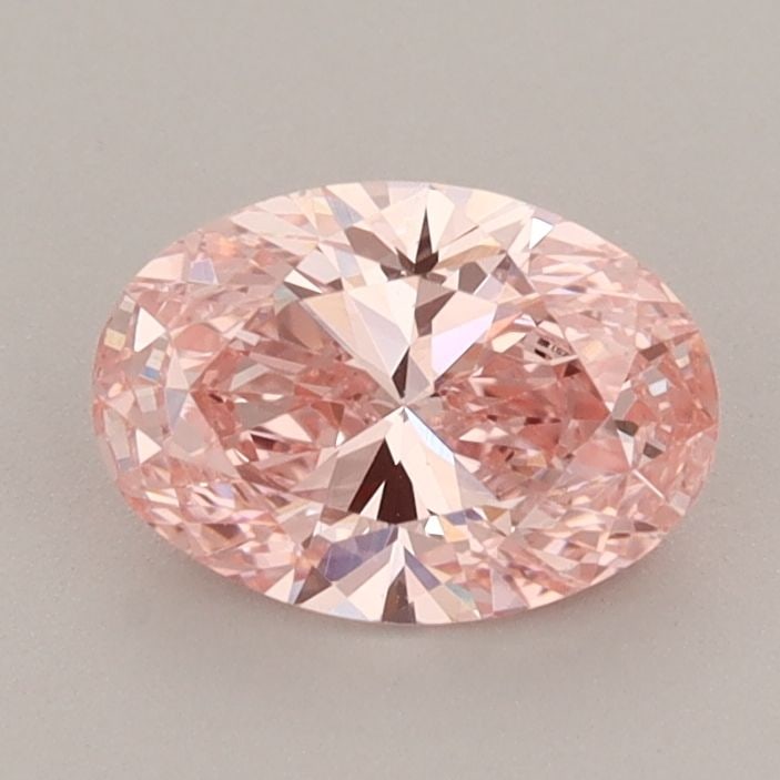 Loose Diamond - OVAL 0.9ct Fancy Vivid Pink VS1: Loose Diamond - OVAL 0.9ct Fancy Vivid Pink VS1 Source: This is a real non-mined Diamond that has been grown in a lab Shape: OVAL Carats: 0.9 Color: Fancy Vivid Pink Certification: IGI Video: