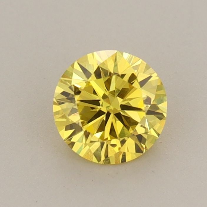 Loose Diamond - ROUND 0.56ct Fancy Vivid Yellow VS1: Loose Diamond - ROUND 0.56ct Fancy Vivid Yellow VS1 Source: This is a real non-mined Diamond that has been grown in a lab Shape: ROUND Carats: 0.56 Color: Fancy Vivid Yellow Certification: IGI Video: