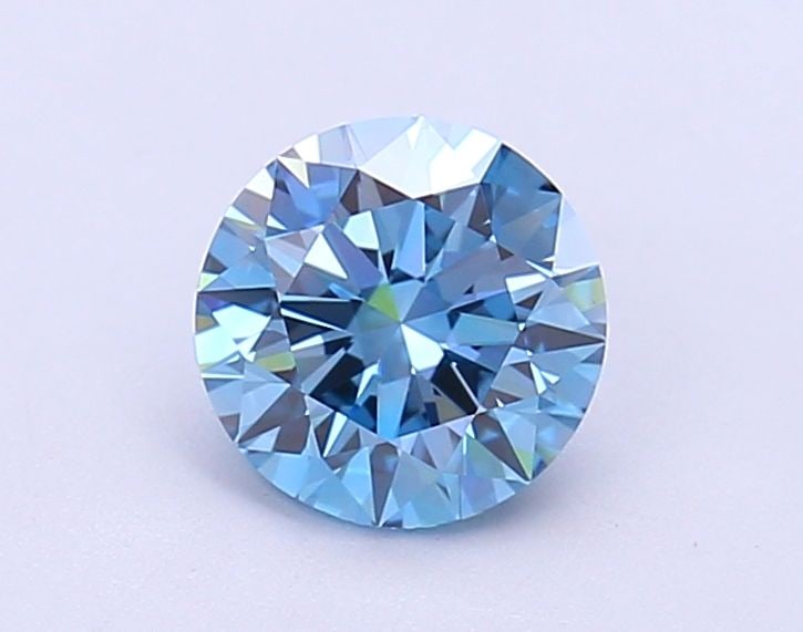 Ideal Loose Diamond - ROUND 1.06ct Fancy Vivid Blue VVS2: Ideal Loose Diamond - ROUND 1.06ct Fancy Vivid Blue VVS2 Source: This is a real non-mined Diamond that has been grown in a lab Shape: ROUND Carats: 1.06 Color: Fancy Vivid Blue Certification: IGI Vide