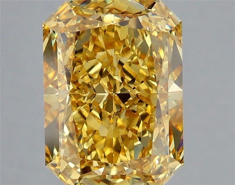 Loose Diamond - RADIANT 5.26ct Fancy Vivid Yellow VS2: Loose Diamond - RADIANT 5.26ct Fancy Vivid Yellow VS2 Source: This is a real non-mined Diamond that has been grown in a lab Shape: RADIANT Carats: 5.26 Color: Fancy Vivid Yellow Certification: IGI Vid