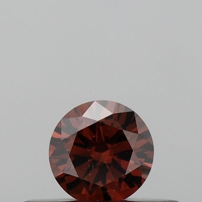 Loose Diamond - ROUND 0.18ct Fancy Deep Orange VS2: Loose Diamond - ROUND 0.18ct Fancy Deep Orange VS2 Source: This is a real non-mined Diamond that has been grown in a lab Shape: ROUND Carats: 0.18 Color: Fancy Deep Orange Certification: IGI Video: