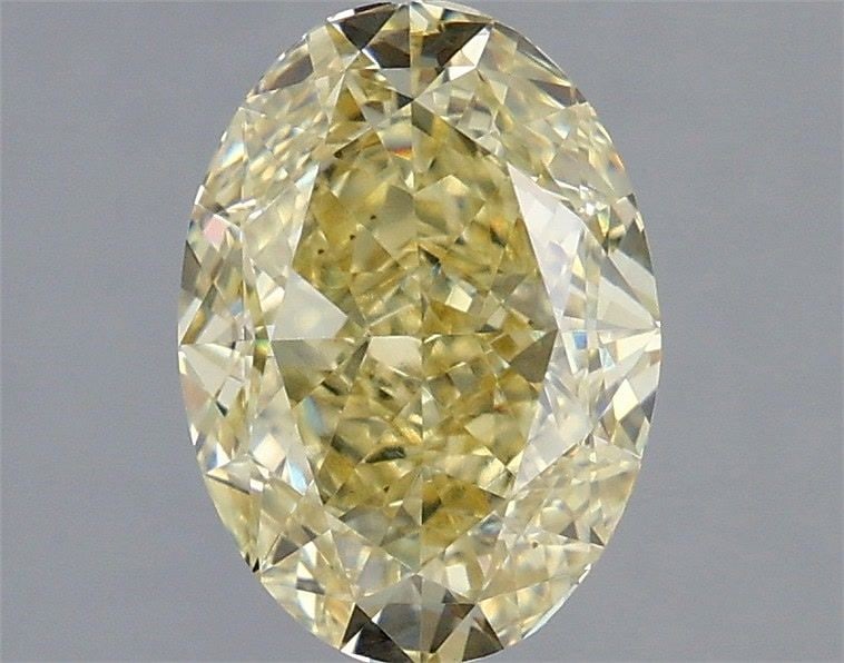 Loose Diamond - OVAL 2.03ct Fancy Yellow VVS2: Loose Diamond - OVAL 2.03ct Fancy Yellow VVS2 Source: This is a real non-mined Diamond that has been grown in a lab Shape: OVAL Carats: 2.03 Color: Fancy Yellow Certification: IGI Video: