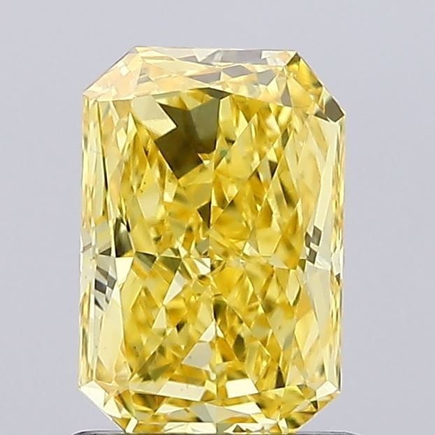 Loose Diamond - RADIANT 1.1ct Fancy Vivid Yellow VS1: Loose Diamond - RADIANT 1.1ct Fancy Vivid Yellow VS1 Source: This is a real non-mined Diamond that has been grown in a lab Shape: RADIANT Carats: 1.1 Color: Fancy Vivid Yellow Certification: IGI Video
