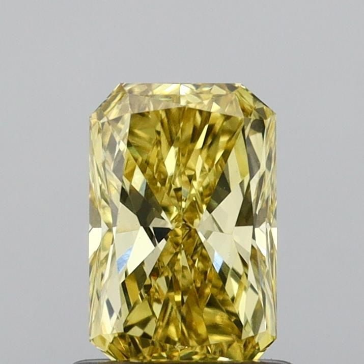 Loose Diamond - RADIANT 0.89ct Fancy Vivid Yellow VS1: Loose Diamond - RADIANT 0.89ct Fancy Vivid Yellow VS1 Source: This is a real non-mined Diamond that has been grown in a lab Shape: RADIANT Carats: 0.89 Color: Fancy Vivid Yellow Certification: IGI Vid