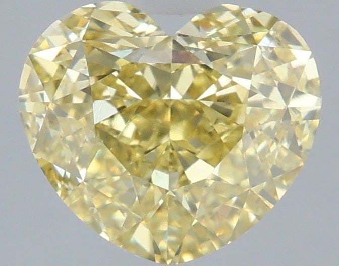 Loose Diamond - HEART 3.1ct Fancy Intense Yellow VS1: Loose Diamond - HEART 3.1ct Fancy Intense Yellow VS1 Source: This is a real non-mined Diamond that has been grown in a lab Shape: HEART Carats: 3.1 Color: Fancy Intense Yellow Certification: IGI Video