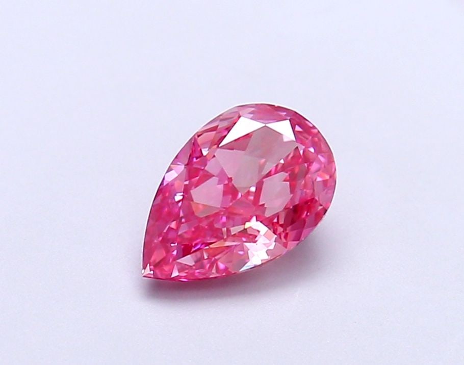 Loose Diamond - PEAR 1.05ct Fancy Vivid Pink VVS1: Loose Diamond - PEAR 1.05ct Fancy Vivid Pink VVS1 Source: This is a real non-mined Diamond that has been grown in a lab Shape: PEAR Carats: 1.05 Color: Fancy Vivid Pink Certification: IGI Video: