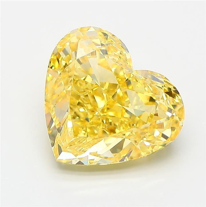 Loose Diamond - HEART 5.06ct Fancy Vivid Yellow VS1: Loose Diamond - HEART 5.06ct Fancy Vivid Yellow VS1 Source: This is a real non-mined Diamond that has been grown in a lab Shape: HEART Carats: 5.06 Color: Fancy Vivid Yellow Certification: IGI Video: