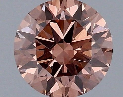 Loose Diamond - ROUND 0.6ct Fancy Pinkish Brown VS1: Loose Diamond - ROUND 0.6ct Fancy Pinkish Brown VS1 Source: This is a real non-mined Diamond that has been grown in a lab Shape: ROUND Carats: 0.6 Color: Fancy Pinkish Brown Certification: IGI Video: