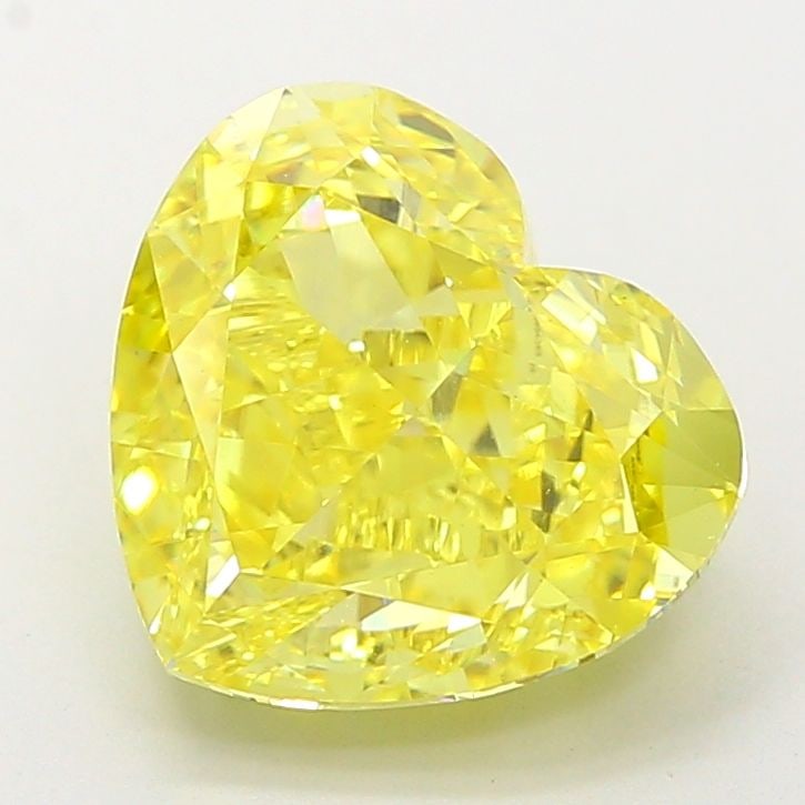 Loose Diamond - HEART 5.09ct Fancy Vivid Yellow VVS2: Loose Diamond - HEART 5.09ct Fancy Vivid Yellow VVS2 Source: This is a real non-mined Diamond that has been grown in a lab Shape: HEART Carats: 5.09 Color: Fancy Vivid Yellow Certification: IGI The Di