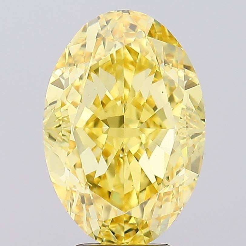 Loose Diamond - OVAL 6.55ct Fancy Vivid Yellow VVS2: Loose Diamond - OVAL 6.55ct Fancy Vivid Yellow VVS2 Source: This is a real non-mined Diamond that has been grown in a lab Shape: OVAL Carats: 6.55 Color: Fancy Vivid Yellow Certification: IGI Video: