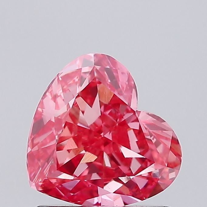 Loose Diamond - HEART 0.9ct Fancy Vivid Pink VS1: Loose Diamond - HEART 0.9ct Fancy Vivid Pink VS1 Source: This is a real non-mined Diamond that has been grown in a lab Shape: HEART Carats: 0.9 Color: Fancy Vivid Pink Certification: IGI Video: