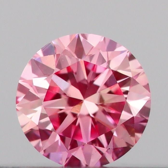 Loose Diamond - ROUND 0.13ct Fancy Vivid Pink VVS2: Loose Diamond - ROUND 0.13ct Fancy Vivid Pink VVS2 Source: This is a real non-mined Diamond that has been grown in a lab Shape: ROUND Carats: 0.13 Color: Fancy Vivid Pink Certification: IGI Video: