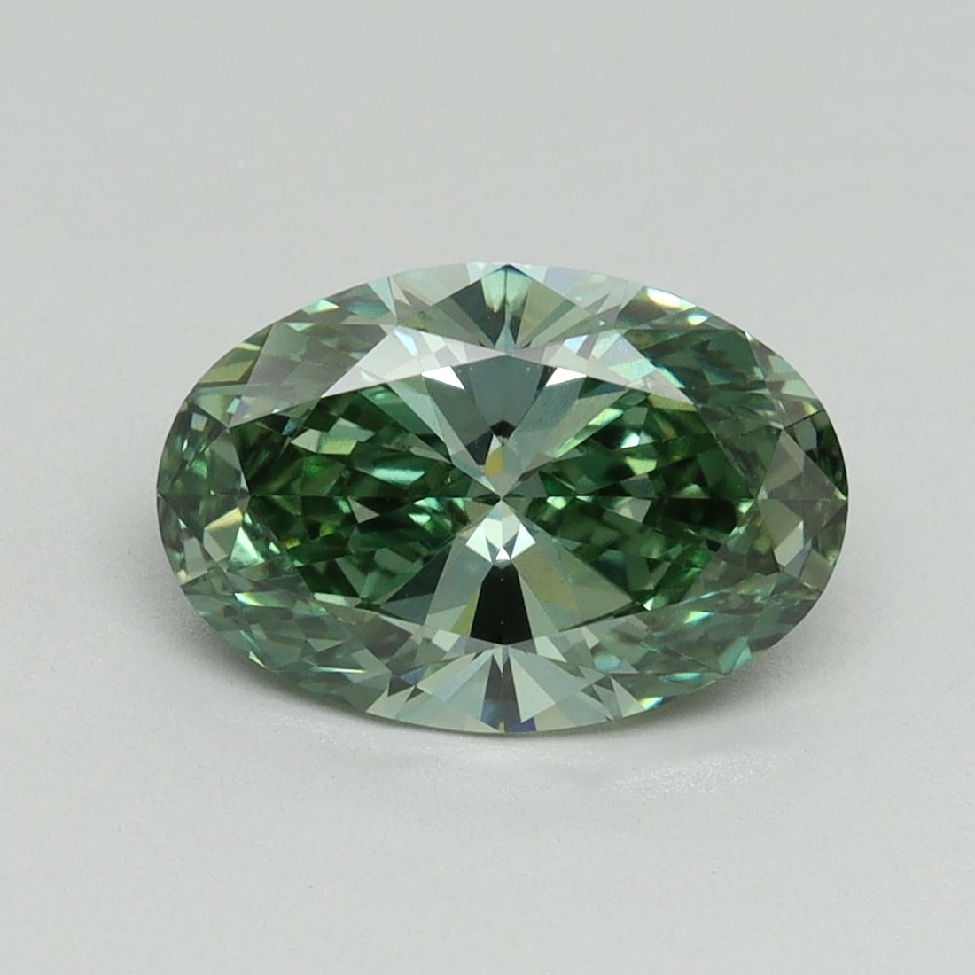 Loose Diamond - OVAL 2.06ct Fancy Vivid Green VVS2: Loose Diamond - OVAL 2.06ct Fancy Vivid Green VVS2 Source: This is a real non-mined Diamond that has been grown in a lab Shape: OVAL Carats: 2.06 Color: Fancy Vivid Green Certification: IGI Video: