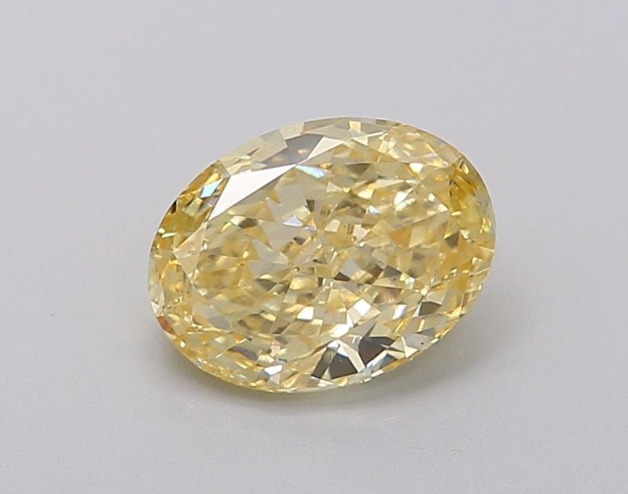 Loose Diamond - OVAL 1.21ct Fancy Intense Yellow VS1: Loose Diamond - OVAL 1.21ct Fancy Intense Yellow VS1 Source: This is a real non-mined Diamond that has been grown in a lab Shape: OVAL Carats: 1.21 Color: Fancy Intense Yellow Certification: IGI Video