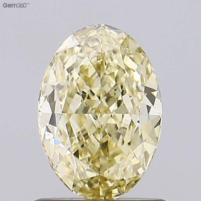 Loose Diamond - OVAL 1.01ct Fancy Yellow VS1: Loose Diamond - OVAL 1.01ct Fancy Yellow VS1 Source: This is a real non-mined Diamond that has been grown in a lab Shape: OVAL Carats: 1.01 Color: Fancy Yellow Certification: IGI Video: