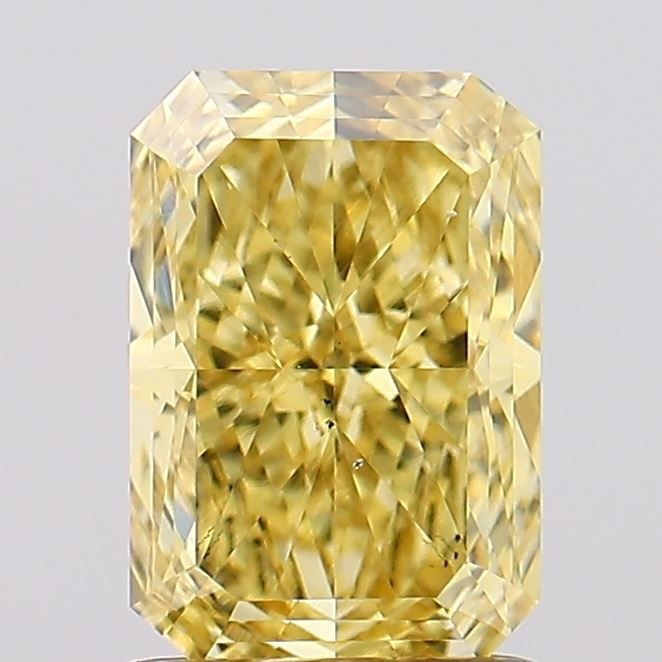 Loose Diamond - RADIANT 1.56ct Fancy Vivid Yellow VS2: Loose Diamond - RADIANT 1.56ct Fancy Vivid Yellow VS2 Source: This is a real non-mined Diamond that has been grown in a lab Shape: RADIANT Carats: 1.56 Color: Fancy Vivid Yellow Certification: IGI Vid