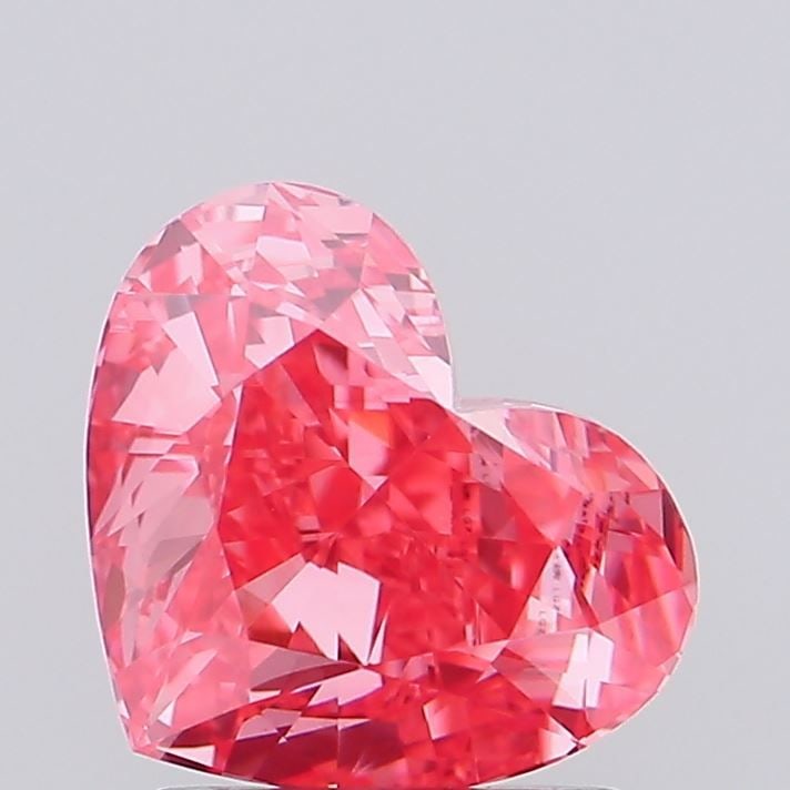 Loose Diamond - HEART 1.59ct Fancy Vivid Pink VVS2: Loose Diamond - HEART 1.59ct Fancy Vivid Pink VVS2 Source: This is a real non-mined Diamond that has been grown in a lab Shape: HEART Carats: 1.59 Color: Fancy Vivid Pink Certification: IGI Video: