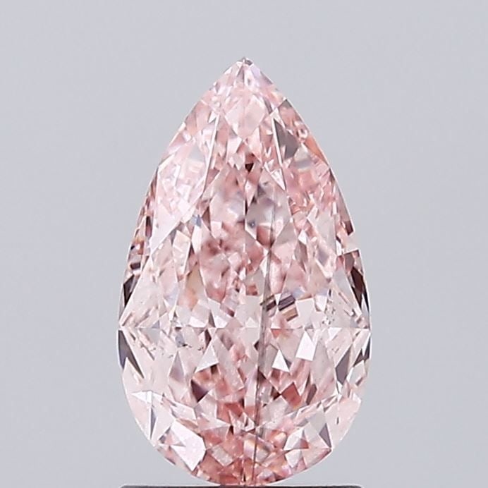 Loose Diamond - PEAR 1.52ct Fancy Vivid Pink SI1: Loose Diamond - PEAR 1.52ct Fancy Vivid Pink SI1 Source: This is a real non-mined Diamond that has been grown in a lab Shape: PEAR Carats: 1.52 Color: Fancy Vivid Pink Certification: IGI Video: Video