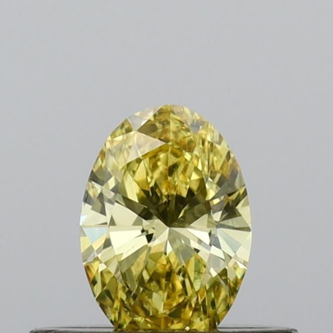 Loose Diamond - OVAL 0.3ct Fancy Vivid Yellow VS1: Loose Diamond - OVAL 0.3ct Fancy Vivid Yellow VS1 Source: This is a real non-mined Diamond that has been grown in a lab Shape: OVAL Carats: 0.3 Color: Fancy Vivid Yellow Certification: IGI Video: