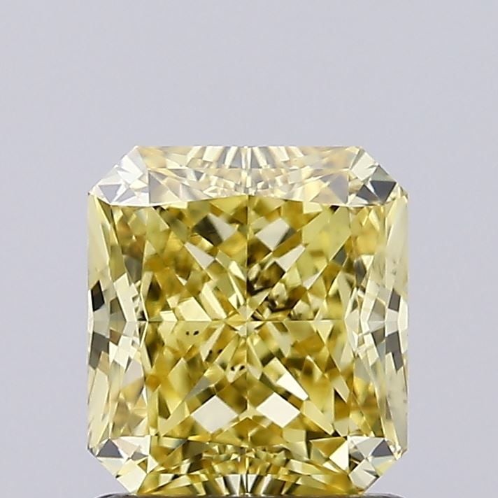 Loose Diamond - RADIANT 1.25ct Fancy Vivid Yellow VS1: Loose Diamond - RADIANT 1.25ct Fancy Vivid Yellow VS1 Source: This is a real non-mined Diamond that has been grown in a lab Shape: RADIANT Carats: 1.25 Color: Fancy Vivid Yellow Certification: IGI Vid