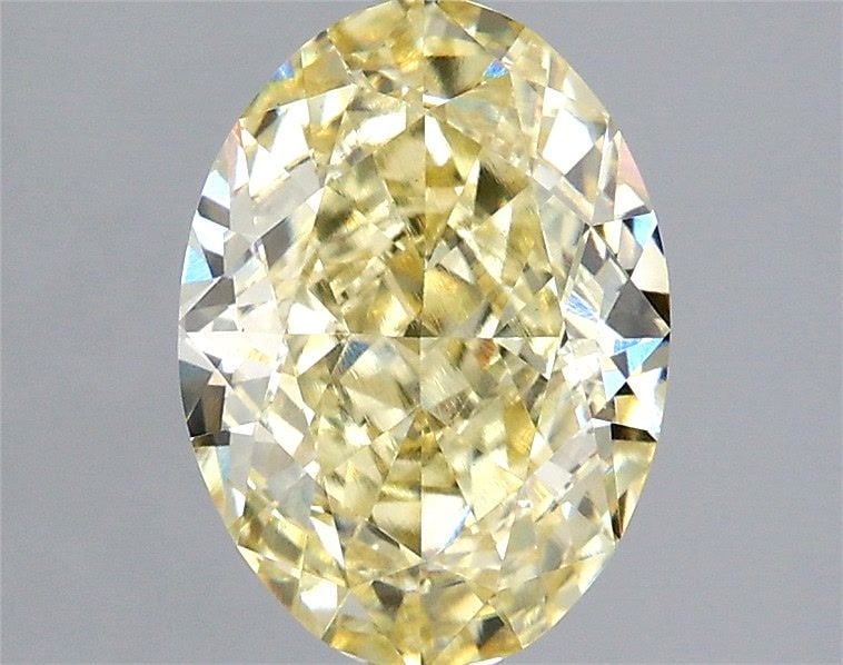 Loose Diamond - OVAL 2.51ct Fancy Yellow VS1: Loose Diamond - OVAL 2.51ct Fancy Yellow VS1 Source: This is a real non-mined Diamond that has been grown in a lab Shape: OVAL Carats: 2.51 Color: Fancy Yellow Certification: IGI Video: