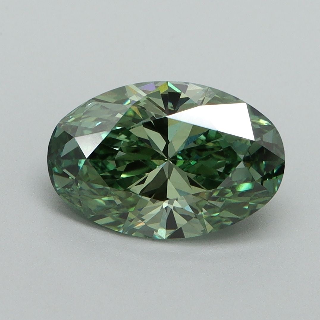 Loose Diamond - OVAL 2.02ct Fancy Vivid Green VS1: Loose Diamond - OVAL 2.02ct Fancy Vivid Green VS1 Source: This is a real non-mined Diamond that has been grown in a lab Shape: OVAL Carats: 2.02 Color: Fancy Vivid Green Certification: IGI Video: