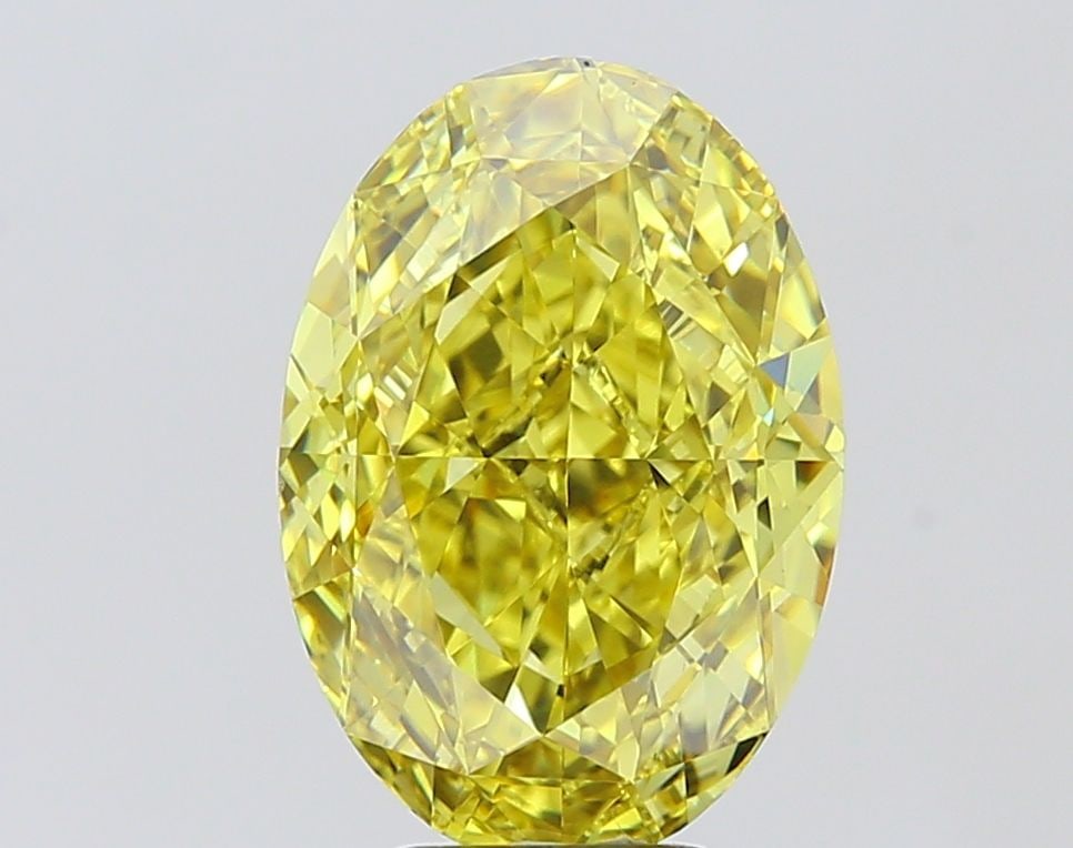 Loose Diamond - OVAL 6.04ct Fancy Vivid Yellow VS1: Loose Diamond - OVAL 6.04ct Fancy Vivid Yellow VS1 Source: This is a real non-mined Diamond that has been grown in a lab Shape: OVAL Carats: 6.04 Color: Fancy Vivid Yellow Certification: IGI Video: