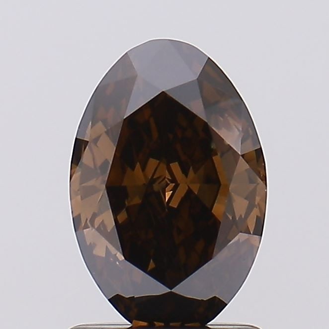 Loose Diamond - OVAL 1.2ct Fancy Deep Brown VS2: Loose Diamond - OVAL 1.2ct Fancy Deep Brown VS2 Source: This is a real non-mined Diamond that has been grown in a lab Shape: OVAL Carats: 1.2 Color: Fancy Deep Brown Certification: IGI Video: