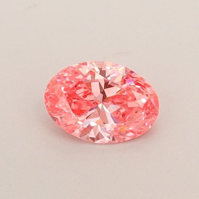 Loose Diamond - OVAL 0.35ct Fancy Vivid Pink VS1: Loose Diamond - OVAL 0.35ct Fancy Vivid Pink VS1 Source: This is a real non-mined Diamond that has been grown in a lab Shape: OVAL Carats: 0.35 Color: Fancy Vivid Pink Certification: IGI Video: