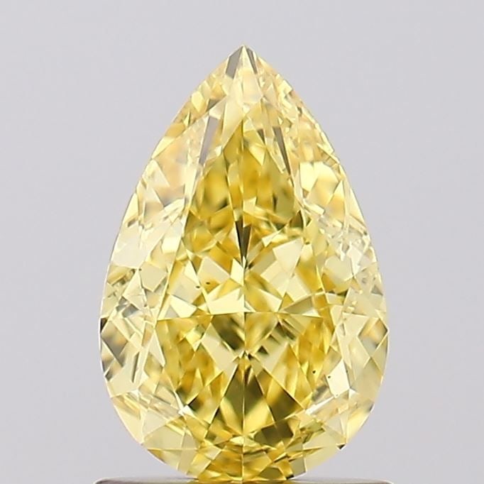 Loose Diamond - PEAR 1.18ct Fancy Vivid Yellow VS1: Loose Diamond - PEAR 1.18ct Fancy Vivid Yellow VS1 Source: This is a real non-mined Diamond that has been grown in a lab Shape: PEAR Carats: 1.18 Color: Fancy Vivid Yellow Certification: IGI Video: