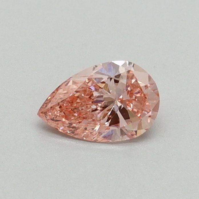 Loose Diamond - PEAR 0.3ct Fancy Vivid Pink SI1: Loose Diamond - PEAR 0.3ct Fancy Vivid Pink SI1 Source: This is a real non-mined Diamond that has been grown in a lab Shape: PEAR Carats: 0.3 Color: Fancy Vivid Pink Certification: IGI Video: