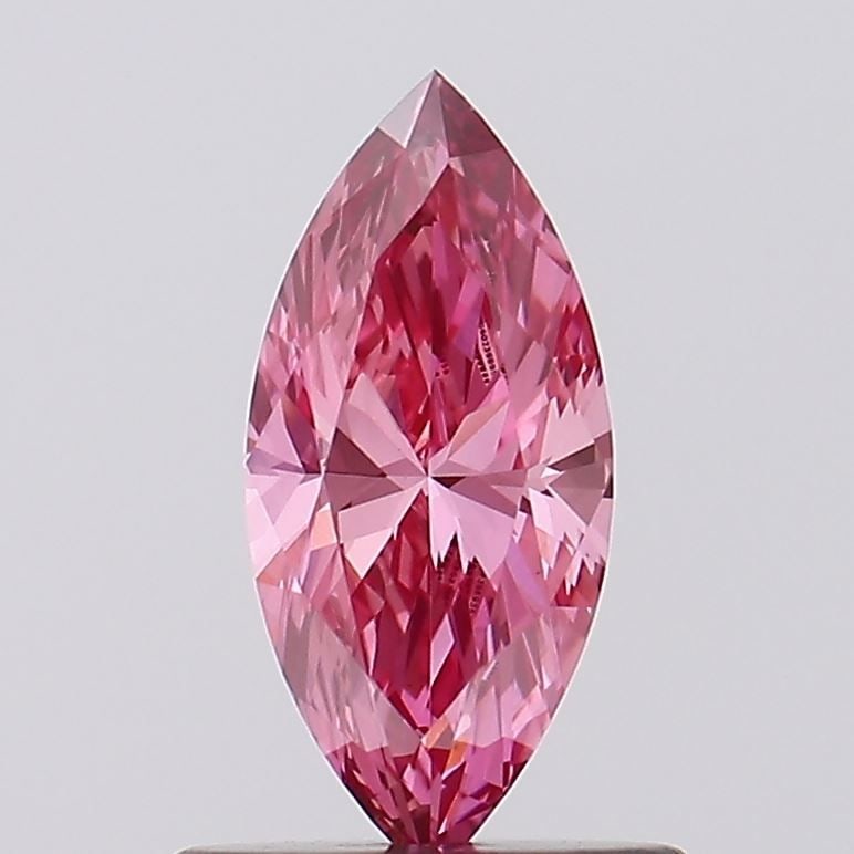 Loose Diamond - MARQUISE 0.57ct Fancy Vivid Pink VS1: Loose Diamond - MARQUISE 0.57ct Fancy Vivid Pink VS1 Source: This is a real non-mined Diamond that has been grown in a lab Shape: MARQUISE Carats: 0.57 Color: Fancy Vivid Pink Certification: IGI Video
