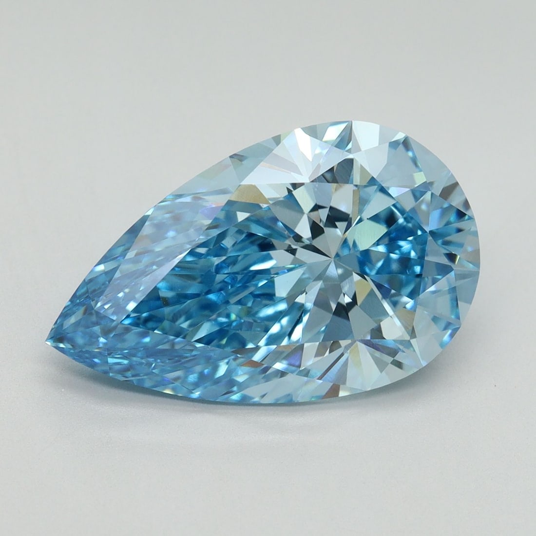 Loose Diamond - PEAR 6.6ct Fancy Vivid Blue VS1: Loose Diamond - PEAR 6.6ct Fancy Vivid Blue VS1 Source: This is a real non-mined Diamond that has been grown in a lab Shape: PEAR Carats: 6.6 Color: Fancy Vivid Blue Certification: IGI Video: