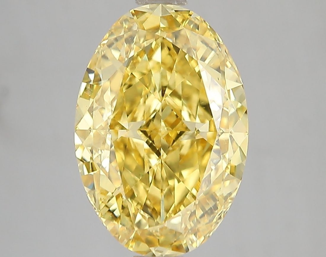 Loose Diamond - OVAL 5.01ct Fancy Vivid Yellow VS2: Loose Diamond - OVAL 5.01ct Fancy Vivid Yellow VS2 Source: This is a real non-mined Diamond that has been grown in a lab Shape: OVAL Carats: 5.01 Color: Fancy Vivid Yellow Certification: IGI Video: