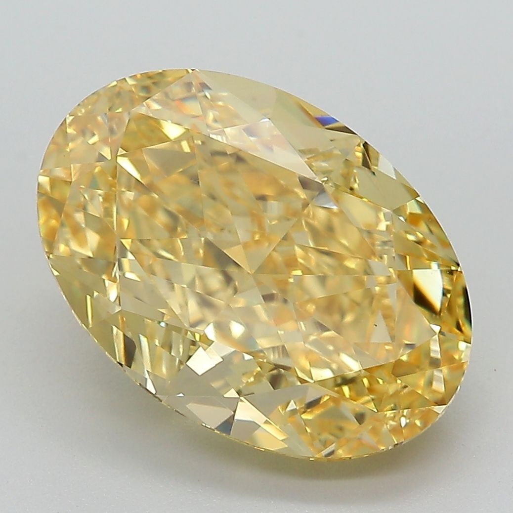 Loose Diamond - OVAL 6.48ct Fancy Vivid Yellow VS1: Loose Diamond - OVAL 6.48ct Fancy Vivid Yellow VS1 Source: This is a real non-mined Diamond that has been grown in a lab Shape: OVAL Carats: 6.48 Color: Fancy Vivid Yellow Certification: IGI Video: