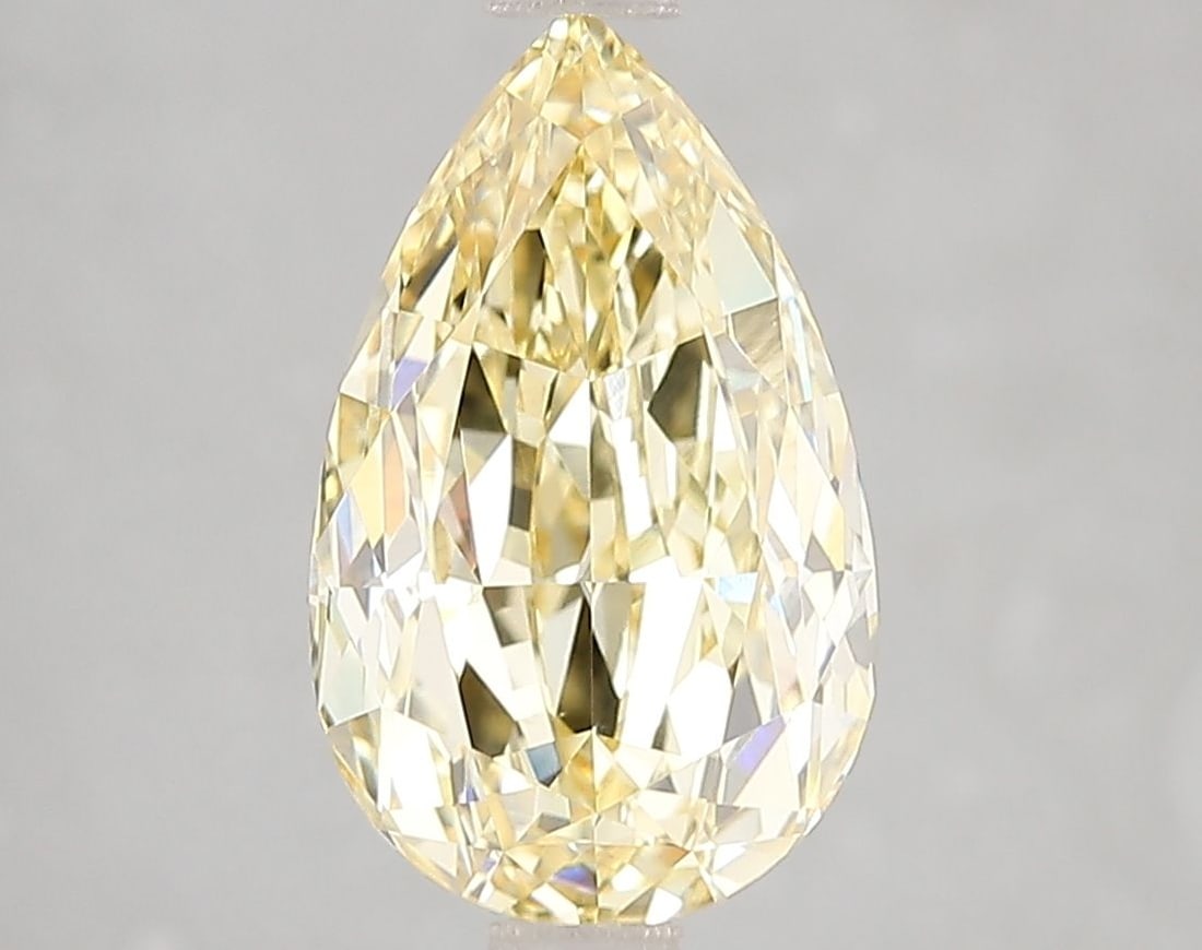 Loose Diamond - PEAR 3.11ct Fancy Intense Yellow VVS2: Loose Diamond - PEAR 3.11ct Fancy Intense Yellow VVS2 Source: This is a real non-mined Diamond that has been grown in a lab Shape: PEAR Carats: 3.11 Color: Fancy Intense Yellow Certification: IGI Vide