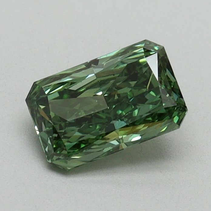 Loose Diamond - RADIANT 0.75ct Fancy Vivid Green VS1: Loose Diamond - RADIANT 0.75ct Fancy Vivid Green VS1 Source: This is a real non-mined Diamond that has been grown in a lab Shape: RADIANT Carats: 0.75 Color: Fancy Vivid Green Certification: IGI Video