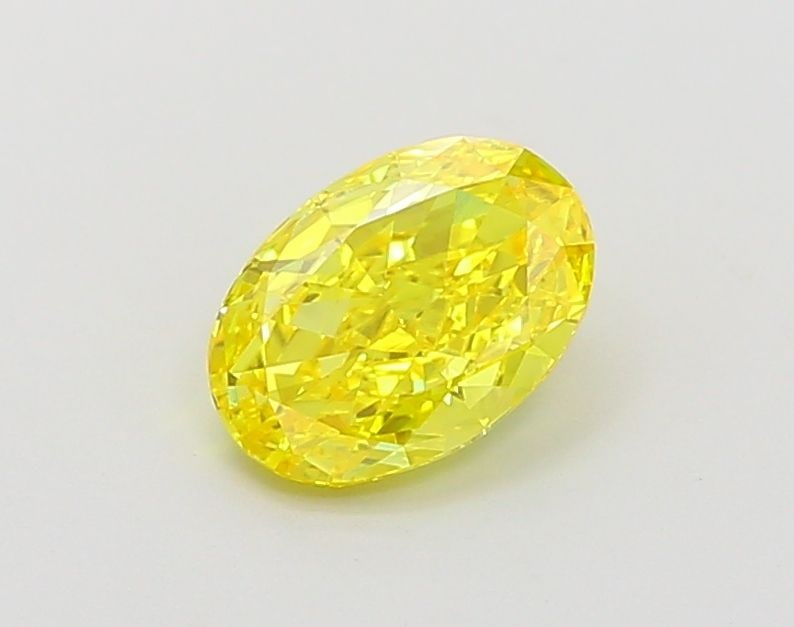 Loose Diamond - OVAL 1.01ct Fancy Vivid Yellow VVS2: Loose Diamond - OVAL 1.01ct Fancy Vivid Yellow VVS2 Source: This is a real non-mined Diamond that has been grown in a lab Shape: OVAL Carats: 1.01 Color: Fancy Vivid Yellow Certification: IGI Video: