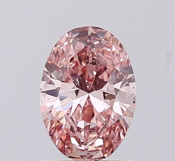 Loose Diamond - OVAL 1.0ct Fancy Intense Pink SI2: Loose Diamond - OVAL 1.0ct Fancy Intense Pink SI2 Source: This is a real non-mined Diamond that has been grown in a lab Shape: OVAL Carats: 1.0 Color: Fancy Intense Pink Certification: IGI Video: