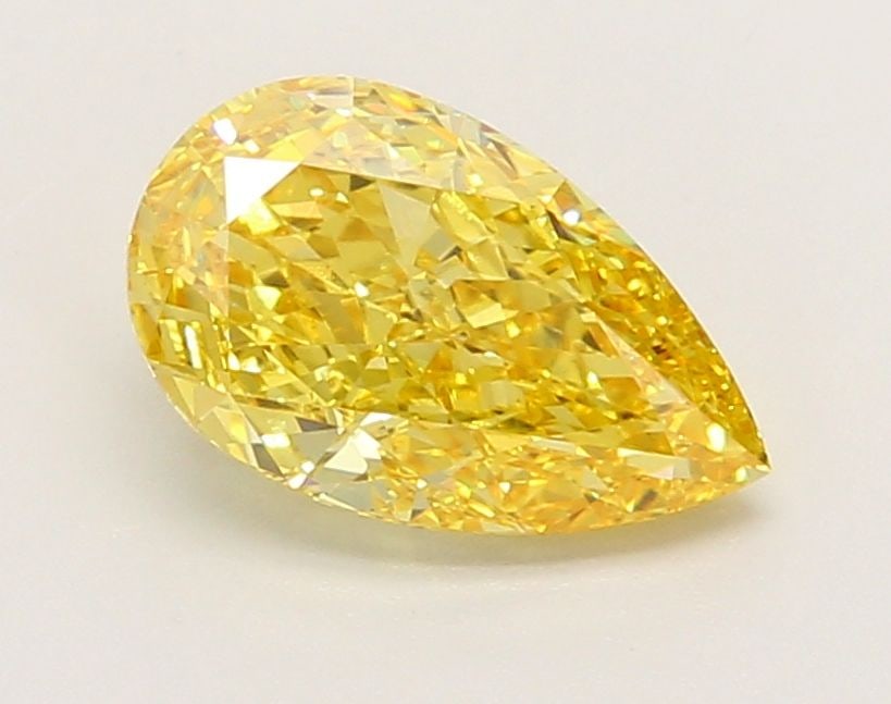 Loose Diamond - PEAR 1.59ct Fancy Vivid Yellow VVS2: Loose Diamond - PEAR 1.59ct Fancy Vivid Yellow VVS2 Source: This is a real non-mined Diamond that has been grown in a lab Shape: PEAR Carats: 1.59 Color: Fancy Vivid Yellow Certification: IGI Video: