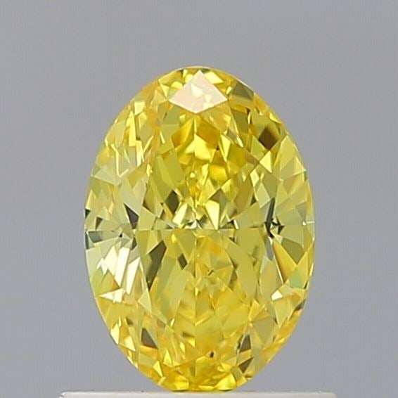 Loose Diamond - OVAL 1.01ct Fancy Vivid Yellow VS2: Loose Diamond - OVAL 1.01ct Fancy Vivid Yellow VS2 Source: This is a real non-mined Diamond that has been grown in a lab Shape: OVAL Carats: 1.01 Color: Fancy Vivid Yellow Certification: IGI Video: