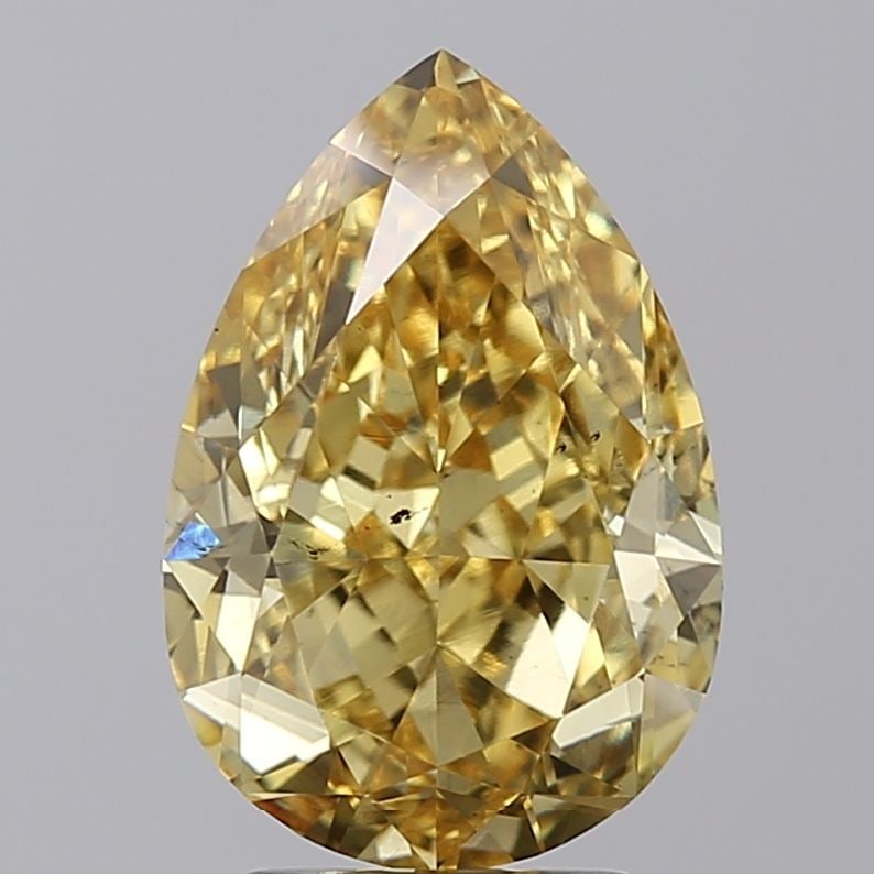 Loose Diamond - PEAR 4.75ct Fancy Vivid Yellow VS2: Loose Diamond - PEAR 4.75ct Fancy Vivid Yellow VS2 Source: This is a real non-mined Diamond that has been grown in a lab Shape: PEAR Carats: 4.75 Color: Fancy Vivid Yellow Certification: IGI Video:
