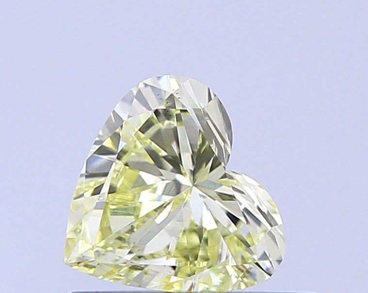 Loose Diamond - HEART 0.5ct Fancy Light Yellow VS1: Loose Diamond - HEART 0.5ct Fancy Light Yellow VS1 Source: This is a real non-mined Diamond that has been grown in a lab Shape: HEART Carats: 0.5 Color: Fancy Light Yellow Certification: IGI Video: