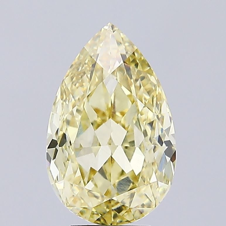 Loose Diamond - PEAR 7.16ct Fancy Intense Yellow VVS2: Loose Diamond - PEAR 7.16ct Fancy Intense Yellow VVS2 Source: This is a real non-mined Diamond that has been grown in a lab Shape: PEAR Carats: 7.16 Color: Fancy Intense Yellow Certification: IGI Vide
