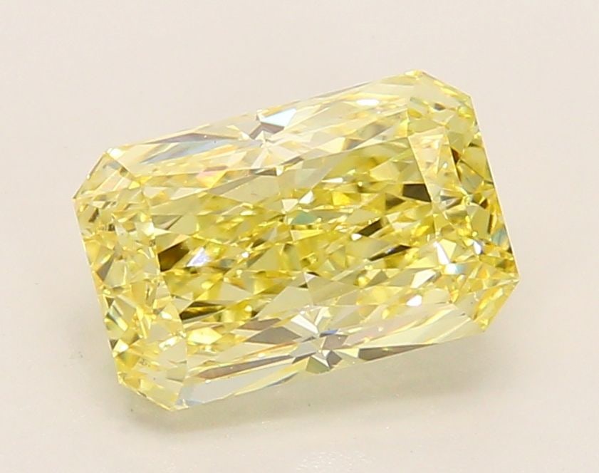 Loose Diamond - RADIANT 2.35ct Fancy Vivid Yellow VS2: Loose Diamond - RADIANT 2.35ct Fancy Vivid Yellow VS2 Source: This is a real non-mined Diamond that has been grown in a lab Shape: RADIANT Carats: 2.35 Color: Fancy Vivid Yellow Certification: IGI Vid
