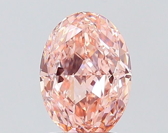 Loose Diamond - OVAL 2.0ct Fancy Vivid Pink VS1: Loose Diamond - OVAL 2.0ct Fancy Vivid Pink VS1 Source: This is a real non-mined Diamond that has been grown in a lab Shape: OVAL Carats: 2.0 Color: Fancy Vivid Pink Certification: IGI Video: